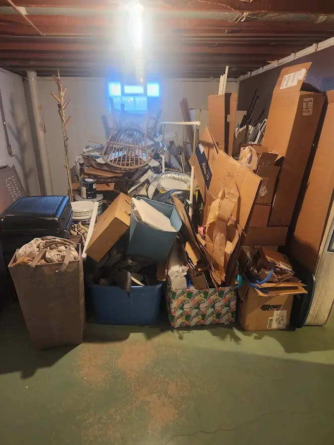 Roll-off dumpster container at job site for 15 Yard Dumpster Rental in Winchester